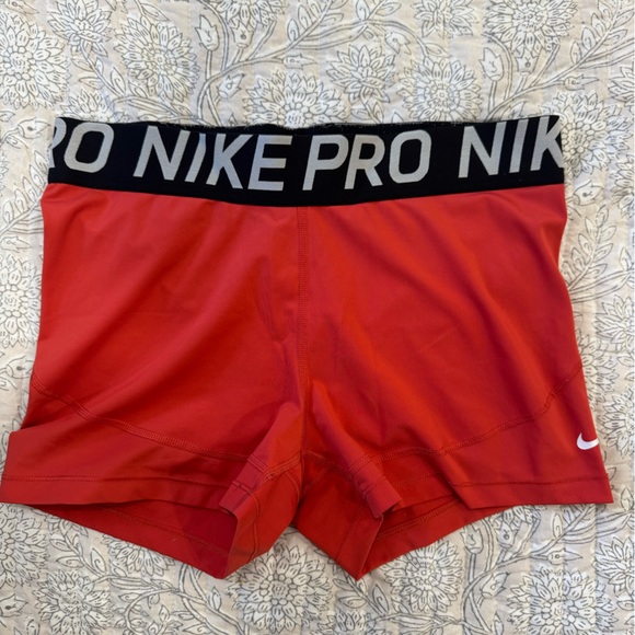 Nike Pro Red Performance Shorts with Black Waistband - Picture 1 of 3